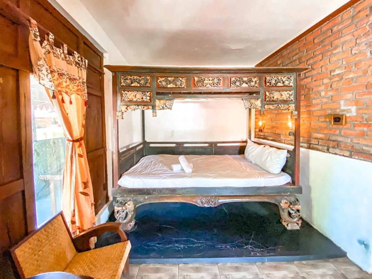 Griya Gribig Guest House Mitra Reddoorz Malang Zewnętrze zdjęcie