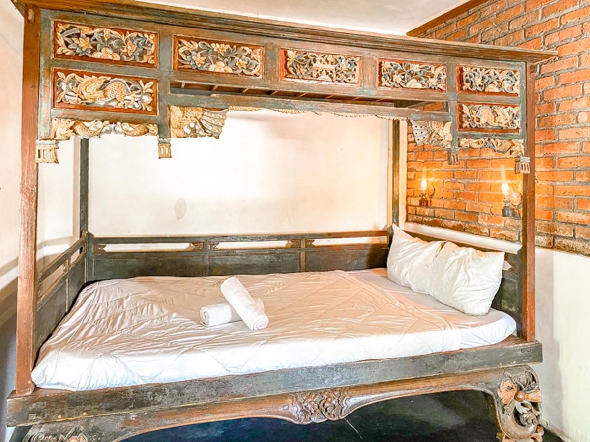 Griya Gribig Guest House Mitra Reddoorz Malang Zewnętrze zdjęcie