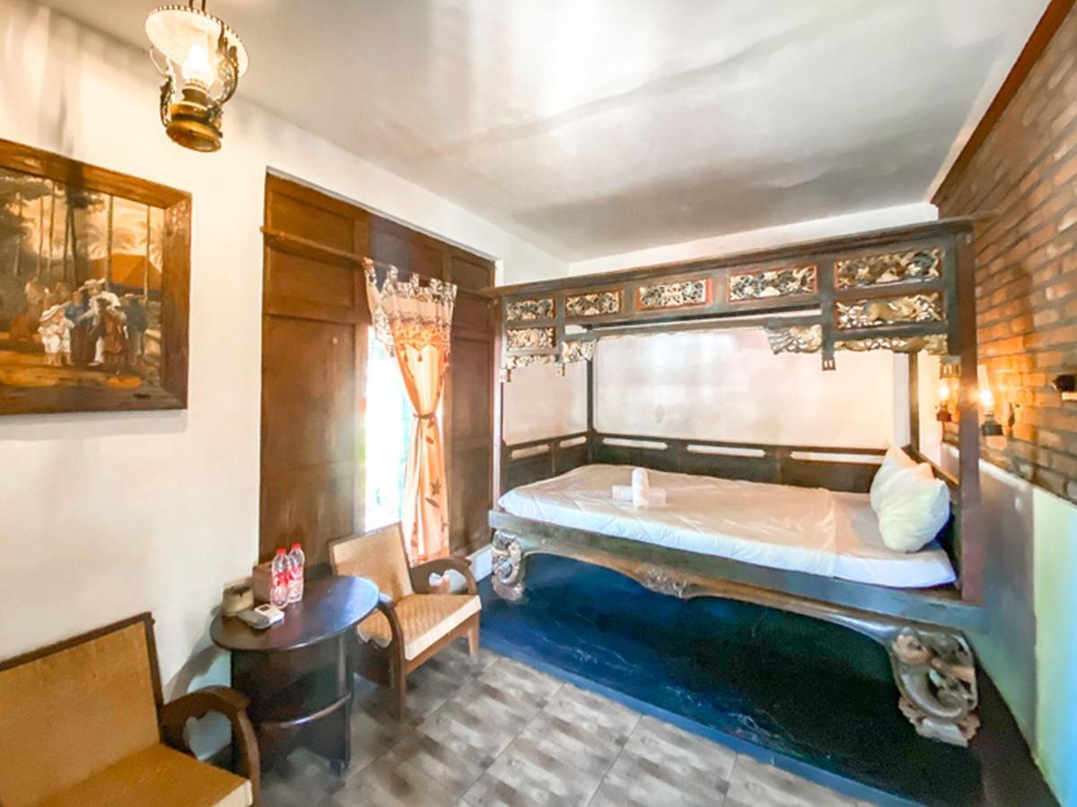 Griya Gribig Guest House Mitra Reddoorz Malang Zewnętrze zdjęcie
