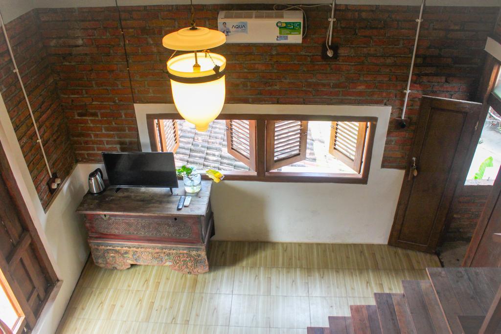 Griya Gribig Guest House Mitra Reddoorz Malang Zewnętrze zdjęcie